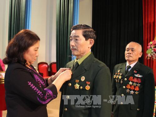 Trao Huân, Huy chương của Nhà nước Lào cho cán bộ, chuyên gia, quân tình nguyện ảnh 1